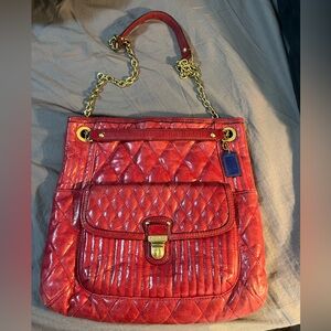 Coach Red Quilted leather Poppy slim tote bag with a gold chain strap. COA